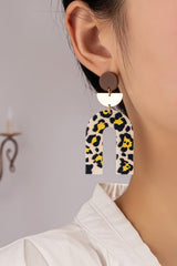 Embossed animal print arch drop earrings